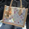 123-scaled-1.webp Louis Vuitton OnTheGo PM LV x TM Bag White Multicolore 25cm M27580