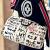 636811505_1442940947842801_1573477584734309511_n.webp Louis Vuitton Keepall Bandoulière Bag 50cm/19.7in Black/White Cowhide N40804