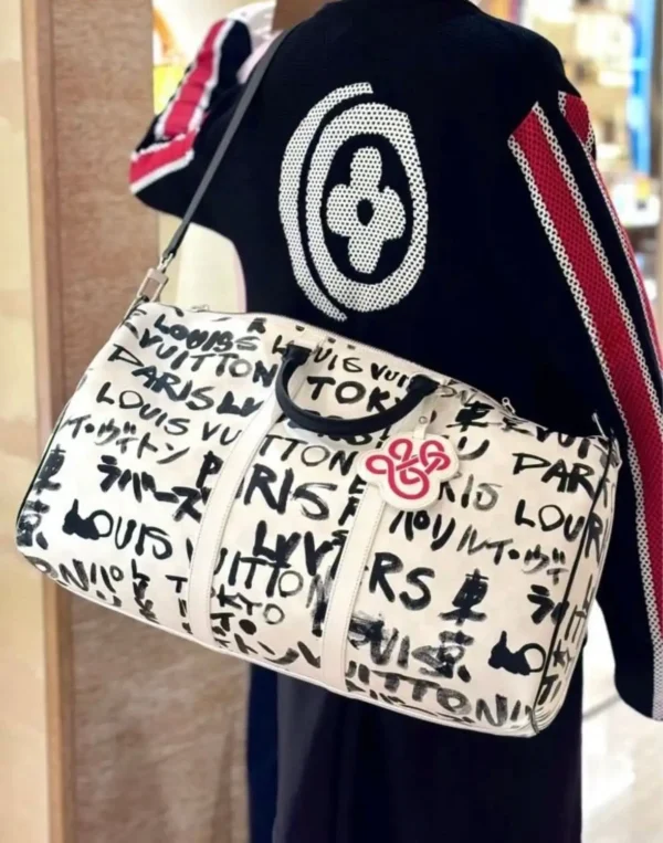 636811505_1442940947842801_1573477584734309511_n.webp Louis Vuitton Keepall Bandoulière Bag 50cm/19.7in Black/White Cowhide N40804