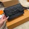 GCSS1-58-1-ed6f8874fc42.webp Louis Vuitton Steamer Wearable Wallet Monogram Taurillon Black 17Cm M81746, Designer Handbags, Womens Purse, luxury bags