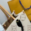 GCSS5-8-2-9c65dd3877cf.webp Louis Vuitton OnTheGo MM Tote Bag ‘Monogram Dune’ 35Cm M46912, Designer Handbags, Womens Purse, luxury bags