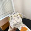 LVBP4-6254f33417d5.webp Louis Vuitton Noe Nano White With Purple 17Cm M82933, Designer Handbags, Womens Purse, luxury bags