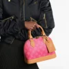 SUPERCLONE-2026-07-03T104847.831.webp Louis Vuitton Alma BB Bag Monogram Origine Rose Ruban 23.5cm M28272