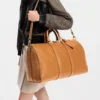 SUPERCLONE-2026-08-11T164541.363.webp Louis Vuitton Keepall Bandoulière 45cm/17.7in Tan Epi Cowhide M3A054