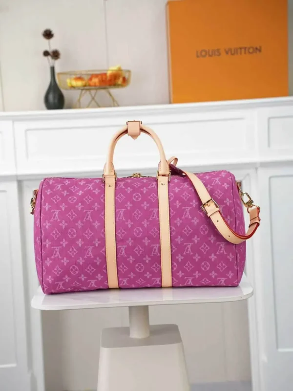 WhatsApp-Image-2026-07-01-at-11.21.20-1.webp Louis Vuitton Keepall 45 Bag Fuchsia Denim M27944