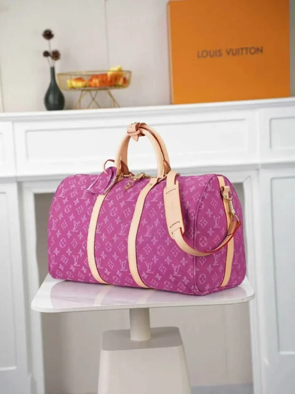 WhatsApp-Image-2026-07-01-at-11.21.20.webp Louis Vuitton Keepall 45 Bag Fuchsia Denim M27944