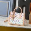 WhatsApp-Image-2026-07-01-at-18.18.14.webp Louis Vuitton OnTheGo PM LV x TM Bag White Multicolore 25cm M27580