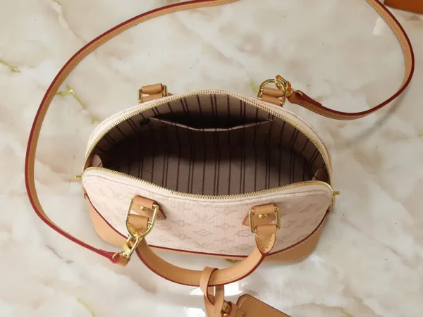 WhatsApp-Image-2026-07-01-at-18.24.24.webp Louis Vuitton Alma BB Bag Monogram Origine Lin 23.5cm M27525