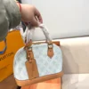 WhatsApp-Image-2026-07-02-at-14.33.09.webp Louis Vuitton Alma BB Bag Monogram Origine Bleu Courrier 23.5cm M27526