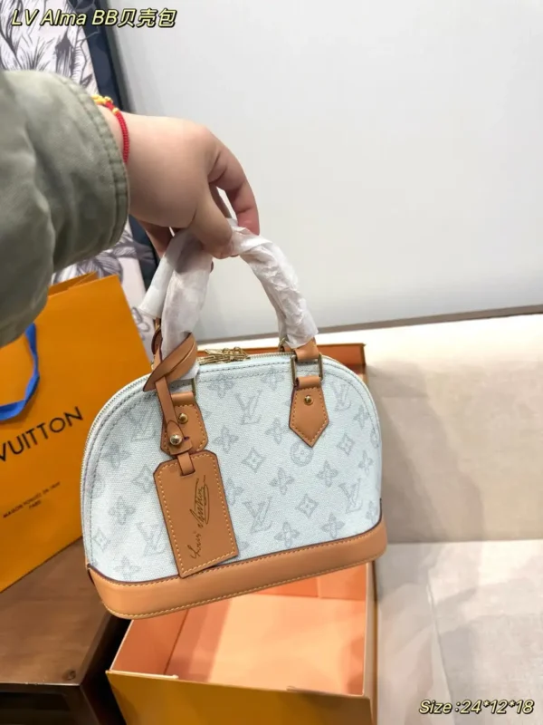WhatsApp-Image-2026-07-02-at-14.33.09.webp Louis Vuitton Alma BB Bag Monogram Origine Bleu Courrier 23.5cm M27526