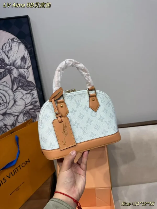 WhatsApp-Image-2026-07-02-at-14.33.10.webp Louis Vuitton Alma BB Bag Monogram Origine Bleu Courrier 23.5cm M27526