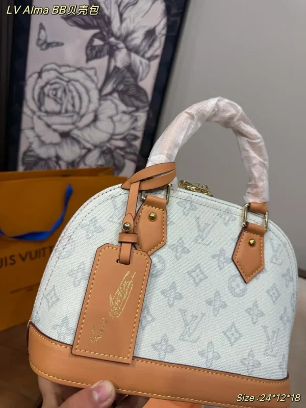 WhatsApp-Image-2026-07-02-at-14.33.11.webp Louis Vuitton Alma BB Bag Monogram Origine Bleu Courrier 23.5cm M27526