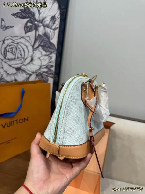 WhatsApp-Image-2026-07-02-at-14.33.12.webp Louis Vuitton Alma BB Bag Monogram Origine Bleu Courrier 23.5cm M27526