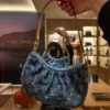 image-71-1cf4dbe7ba55.webp Louis Vuitton Pochette Valley Bag Denim Blue 21cm M13571