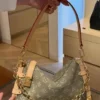 image-82.webp Louis Vuitton East West MM Side Trunk Bag Khaki Denim 28cm M27451