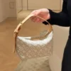 image-89-824e7cce5e65.webp Louis Vuitton Pochette Hills Monogram Emblème Pattern In Peuplier Color 18.5cm M29879