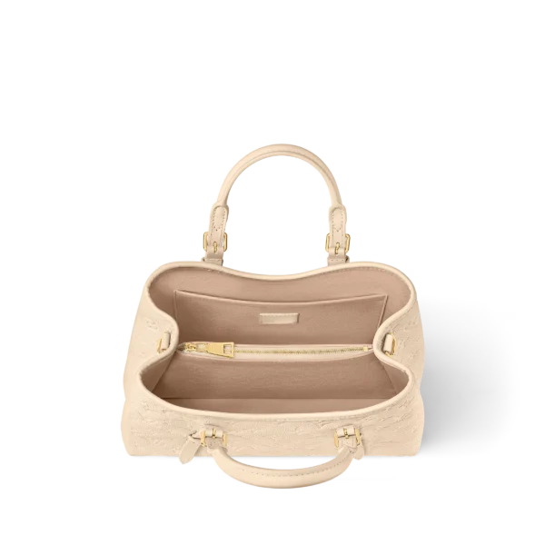 jpg-cb0e51d7ae70.webp Babylone Tote PM