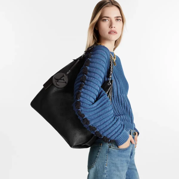 louis-vuitton-carmel-M52950_PM1_Cropped-worn-view-a47aa38c9491.webp Carmel