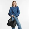 louis-vuitton-carmel-M52950_PM1_Worn-view-70d694b23652.webp Carmel
