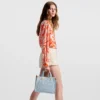 louis-vuitton-let-go-pm-M24897_PM1_Cropped-worn-view-4f87f6a0bc52.webp Let Go PM