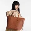 louis-vuitton-neverfull-mm-M12605_PM1_Worn_20view-b59b0c6c6845.webp Louis Vuitton Neverfull Mm Tote Bag Cognac Brown 31cm M12605, Designer Handbags, Womens Purse, luxury bags