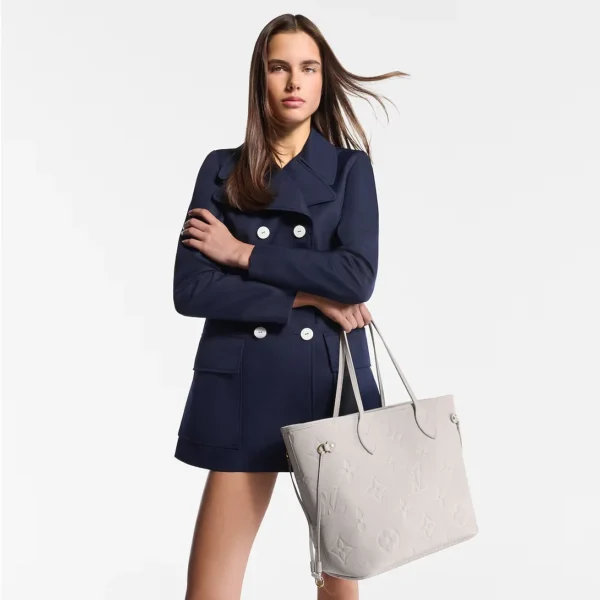 louis-vuitton-neverfull-mm-M13758_PM1_Cropped_20worn_20view-b7957aa7b04e.webp Louis Vuitton Neverfull Mm Tote Bag Brume Gray 31cm M13758, Designer Handbags, Womens Purse, luxury bags
