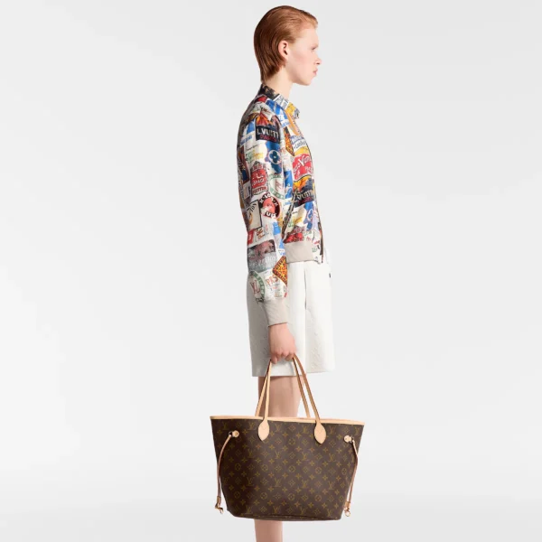 louis-vuitton-neverfull-mm-M46975_PM1_Cropped-worn-view-d483e37886cf.webp Neverfull MM