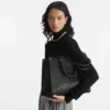 louis-vuitton-onthego-mm-M45595_PM1_Cropped-worn-view-df11cd697bba.webp Onthego MM