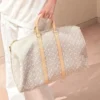 Louis Vuitton Keepall Bandoulière Bag Beige Pepper 45cm M29670
